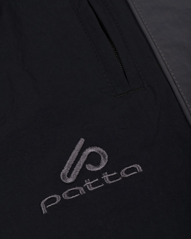Patta Panelled Oversized Track Pants (Black) Patta