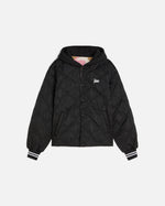 front image of the black side of the reversible bomber jacket showing the quilted panels and a patta script logo