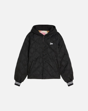 front image of the black side of the reversible bomber jacket showing the quilted panels and a patta script logo