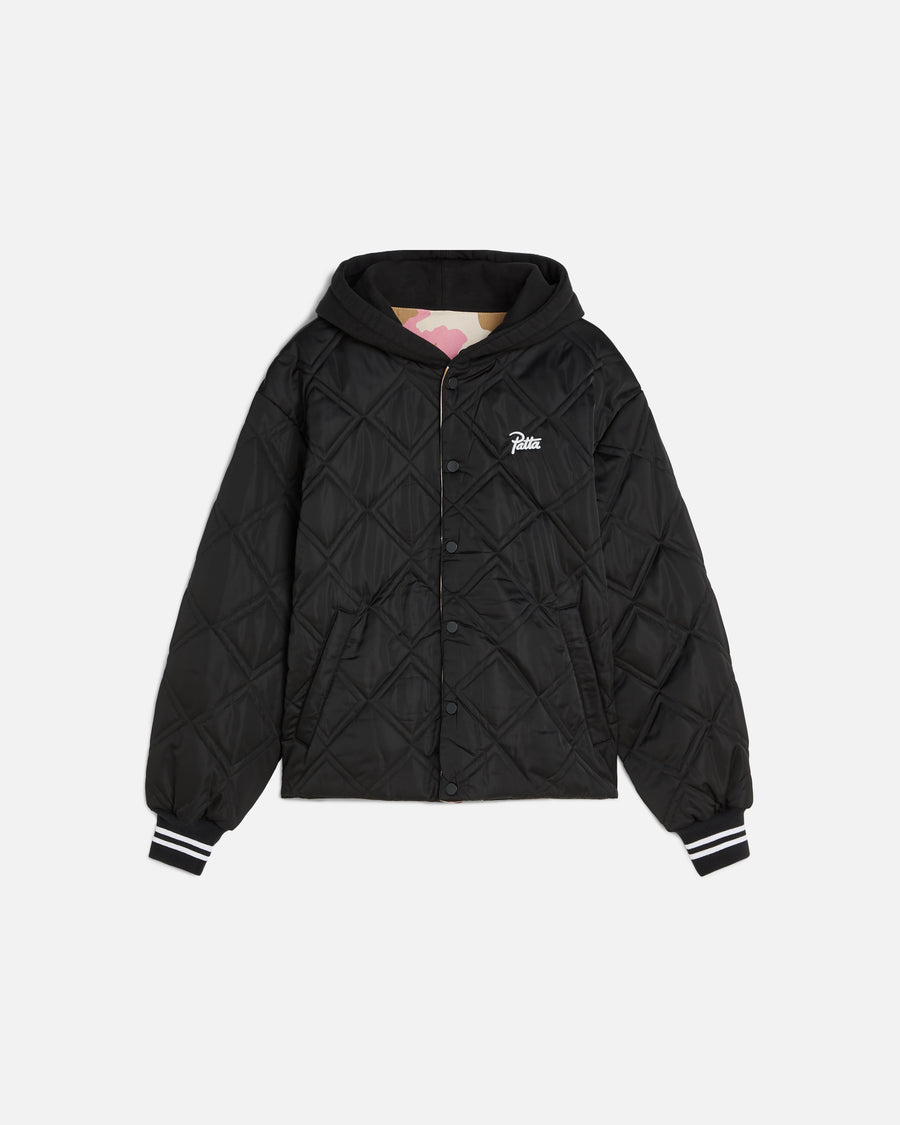 front image of the black side of the reversible bomber jacket showing the quilted panels and a patta script logo